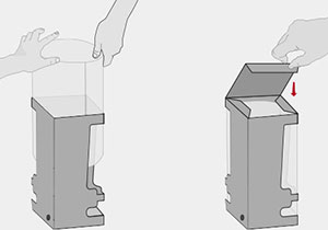 Montura de acrílico en interior de caja de cartón con ampolleta